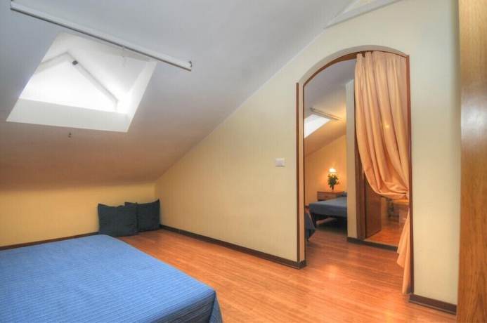 Imagen de la habitación del Hotel Al Cavallino Bianco, Lignano Sabbiadoro. Foto 5