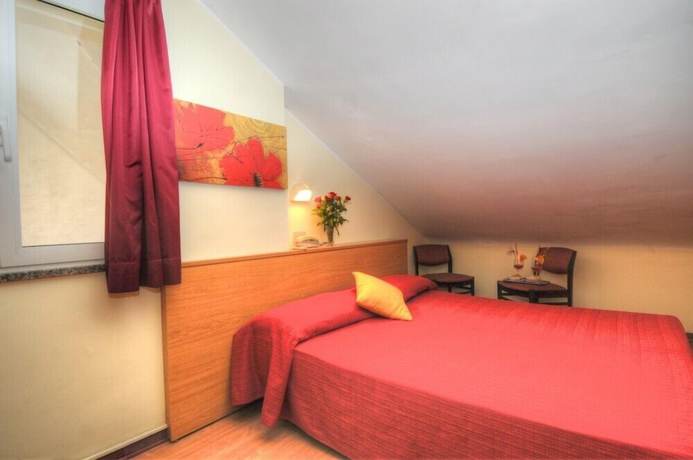 Imagen de la habitación del Hotel Al Cavallino Bianco, Lignano Sabbiadoro. Foto 9