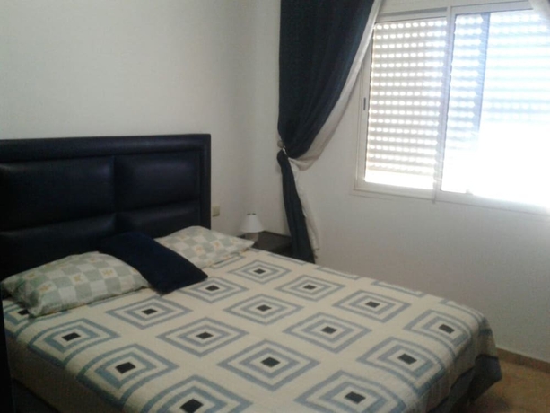 Imagen de la habitación del Hotel Al Cudia Smir Beach Resort. Foto 7