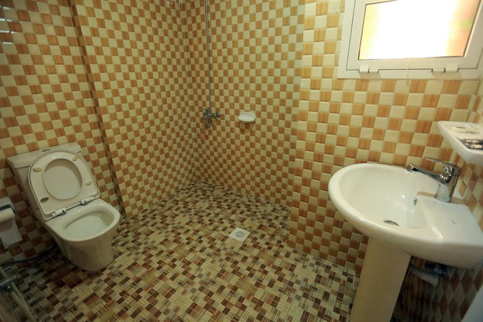 Imagen de la habitación del Hotel Al Dhiyafa Palace Apartment. Foto 12