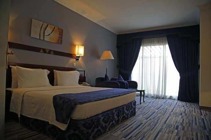 Imagen de la habitación del Hotel Al Diafah Suites. Foto 4