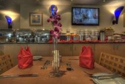 Imagen del bar/restaurante del Hotel Al Diar Palm Suites. Foto 3