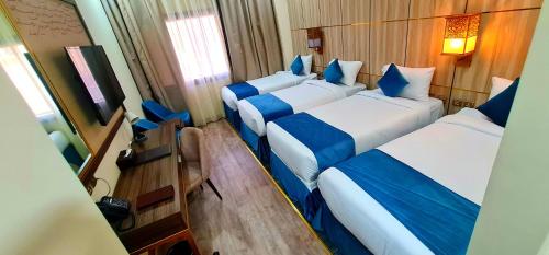 Imagen de la habitación del Hotel Al Ebaa. Foto 4
