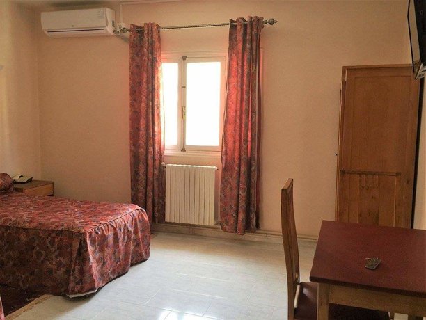 Imagen de la habitación del Hotel Al Fajr, Uchda. Foto 6