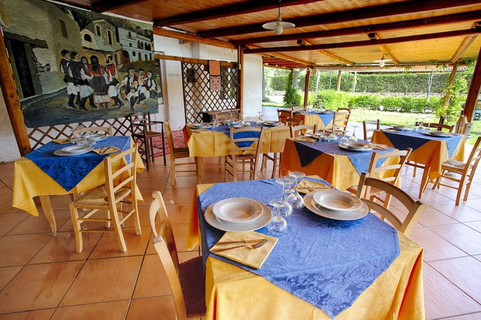 Imagen del bar/restaurante del Hotel Al Faro, San Teodoro . Foto 2
