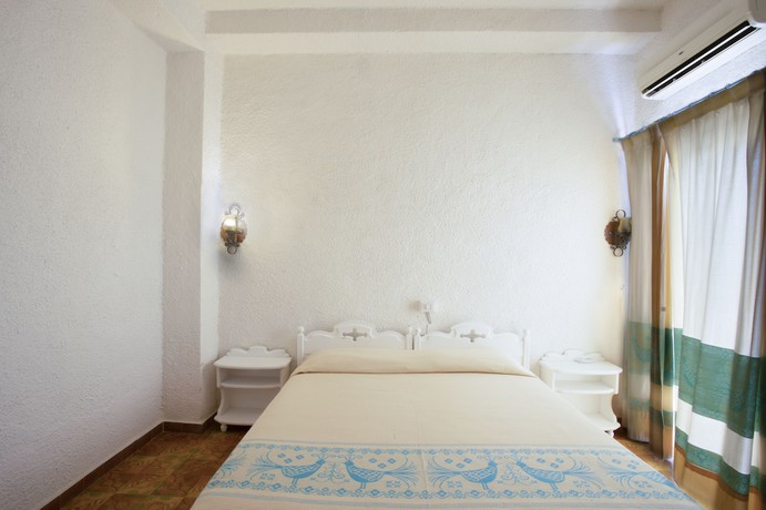 Imagen de la habitación del Hotel Al Faro, San Teodoro . Foto 11