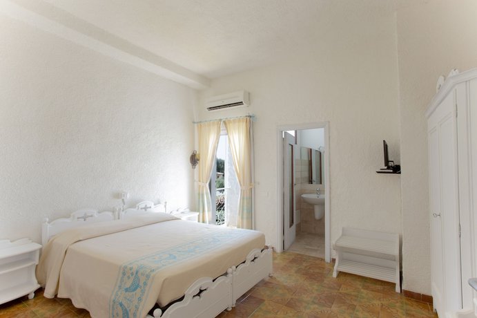 Imagen de la habitación del Hotel Al Faro, San Teodoro . Foto 12