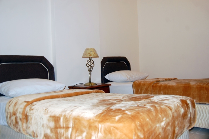 Imagen de la habitación del Hotel Al Ferdous Apartment. Foto 6