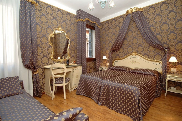 Imagen de la habitación del Hotel Al Gazzettino. Foto 9