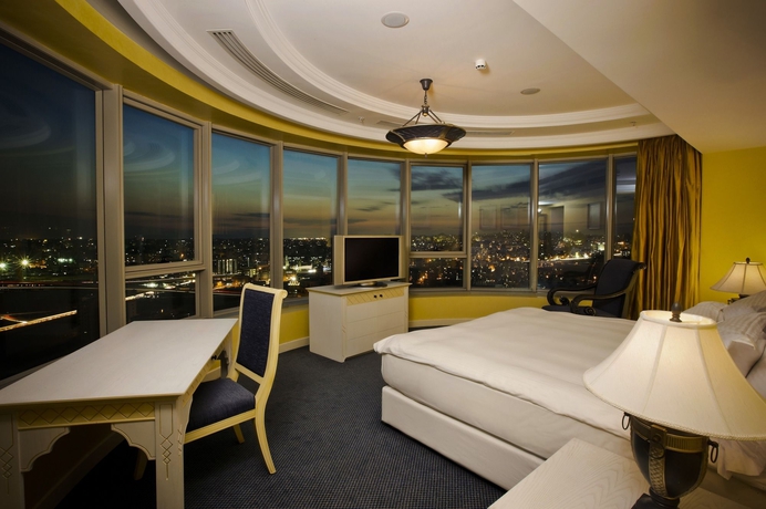 Imagen de la habitación del Hotel Al Habtoor Grand. Foto 9