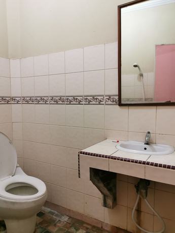 Imagen de la habitación del Hotel Al Hakim Syariah. Foto 3