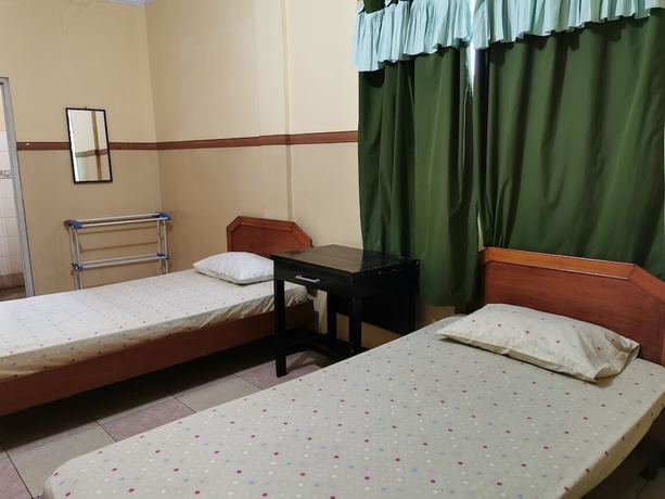 Imagen de la habitación del Hotel Al Hakim Syariah. Foto 4