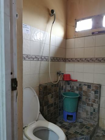 Imagen de la habitación del Hotel Al Hakim Syariah. Foto 8