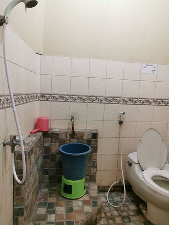 Imagen de la habitación del Hotel Al Hakim Syariah. Foto 13