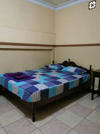 Imagen de la habitación del Hotel Al Hakim Syariah. Foto 17