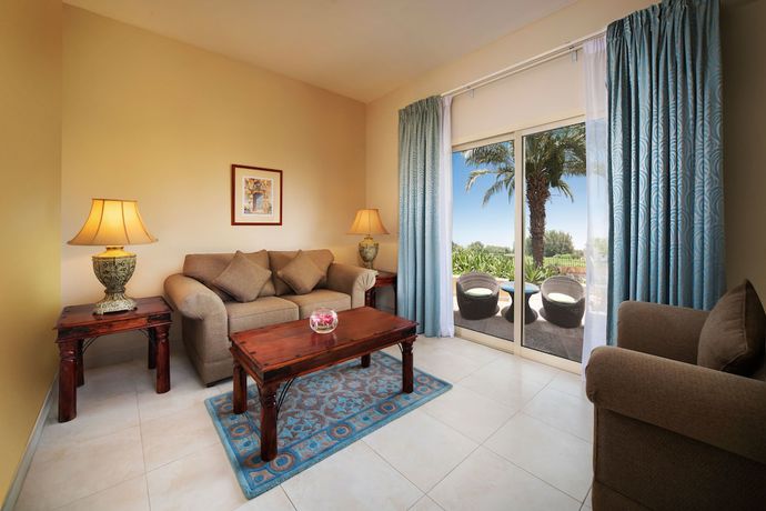 Imagen de la habitación del Hotel Al Hamra Village. Foto 12