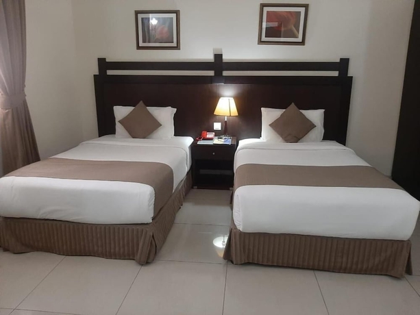 Imagen de la habitación del Hotel Al Hayat Suites. Foto 13