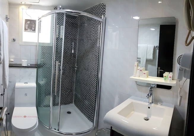 Imagen de la habitación del Hotel Al Jawhara Metro. Foto 16