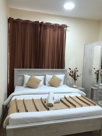 Imagen de la habitación del Hotel Al Khaleej Plaza Apartment. Foto 8