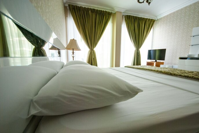 Imagen de la habitación del Hotel Al Khalidiah Resort. Foto 19