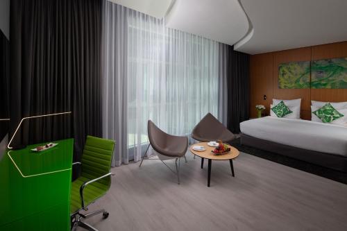 Imagen de la habitación del Hotel Al Khoory Sky Garden. Foto 20