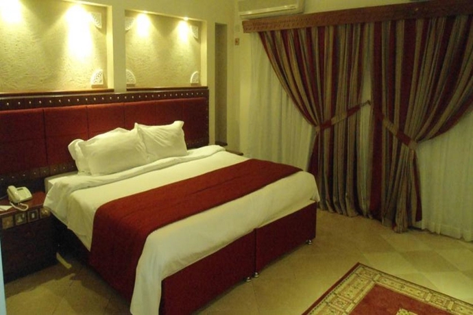 Imagen de la habitación del Hotel Al Liwan Suites. Foto 5