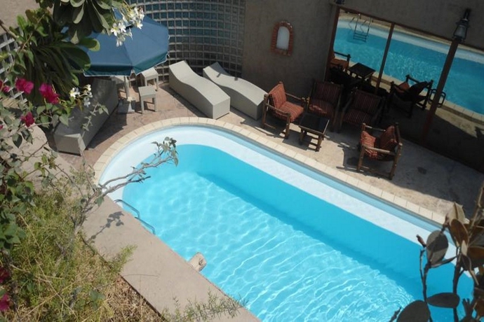 Imagen de la piscina del Hotel Al Liwan Suites. Foto 6