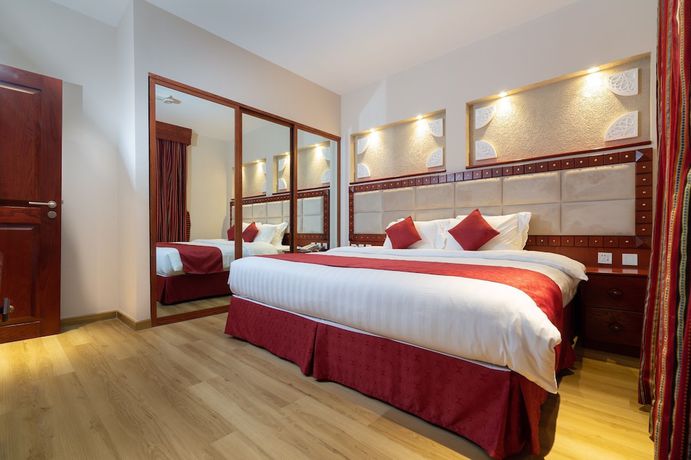 Imagen de la habitación del Hotel Al Liwan Suites Rawdat Al Khail. Foto 13