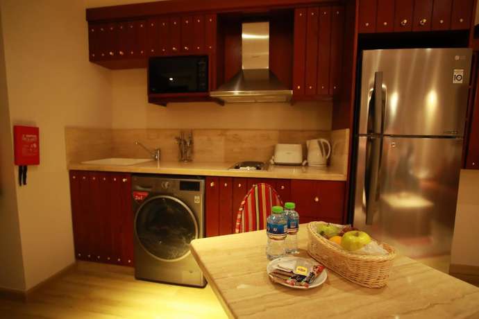 Imagen de la habitación del Hotel Al Liwan Suites Rawdat Al Khail. Foto 14
