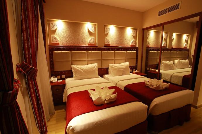 Imagen de la habitación del Hotel Al Liwan Suites Rawdat Al Khail. Foto 17