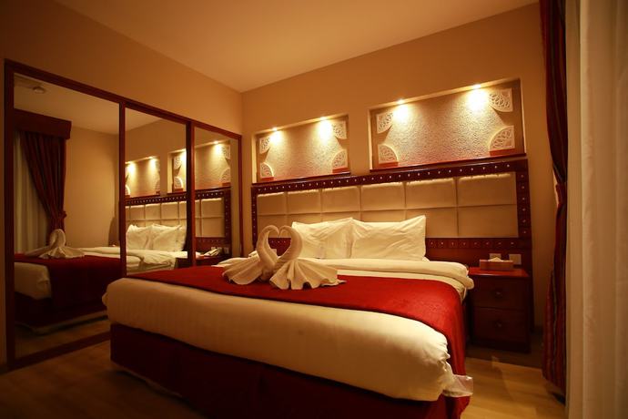 Imagen de la habitación del Hotel Al Liwan Suites Rawdat Al Khail. Foto 19