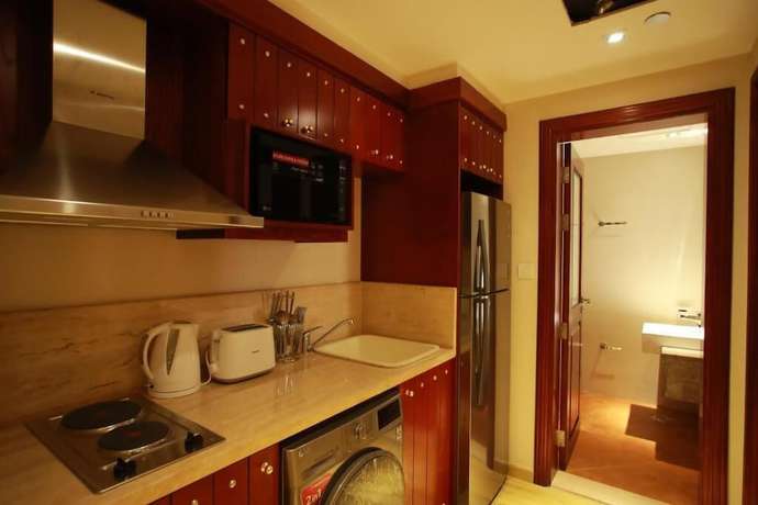 Imagen de la habitación del Hotel Al Liwan Suites Rawdat Al Khail. Foto 20