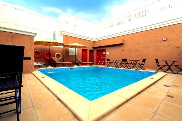 Imagen general del Hotel Al Liwan Suites Rawdat Al Khail. Foto 2