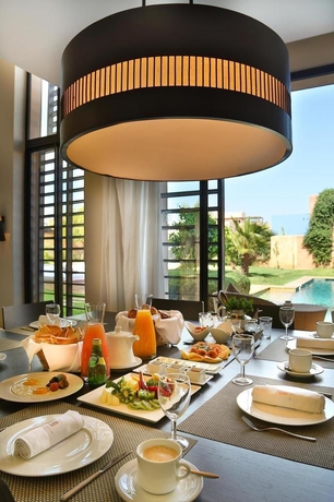 Imagen del bar/restaurante del Hotel Al Maaden Villa & Spa. Foto 6