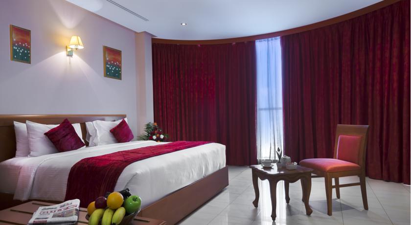 Imagen de la habitación del Hotel Al Madina Suites Doha. Foto 4