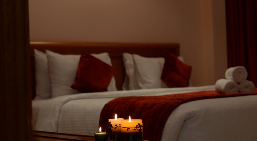 Imagen de la habitación del Hotel Al Madina Suites Doha. Foto 5