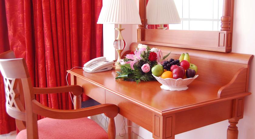 Imagen de la habitación del Hotel Al Madina Suites Doha. Foto 6