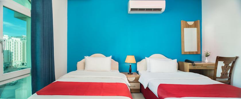 Imagen de la habitación del Hotel Al Manaf Suites. Foto 2