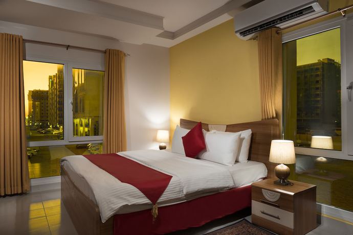 Imagen de la habitación del Hotel Al Manaf Suites. Foto 6