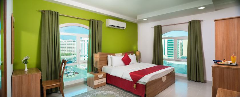 Imagen de la habitación del Hotel Al Manaf Suites. Foto 9