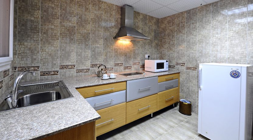 Imagen de la habitación del Hotel Al Manaf Suites. Foto 11