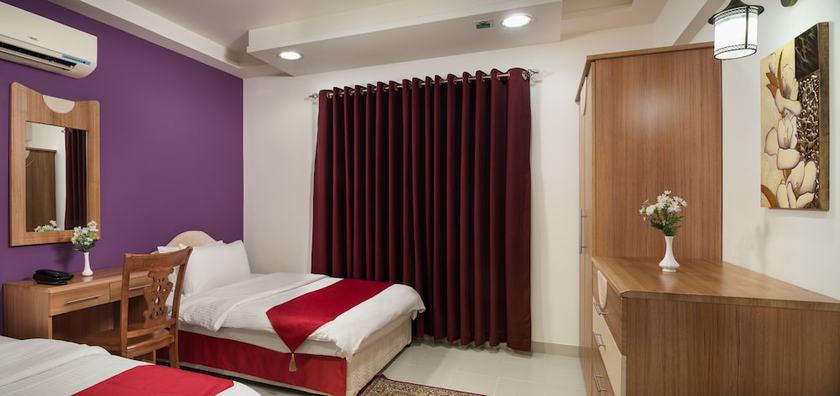 Imagen de la habitación del Hotel Al Manaf Suites. Foto 12