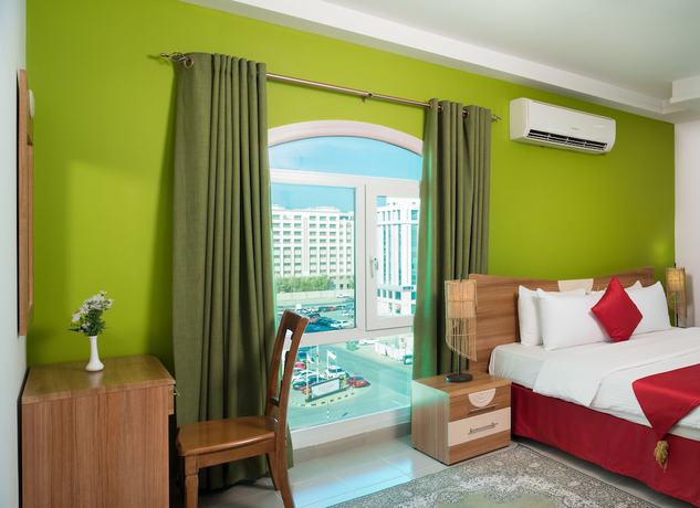 Imagen de la habitación del Hotel Al Manaf Suites. Foto 13