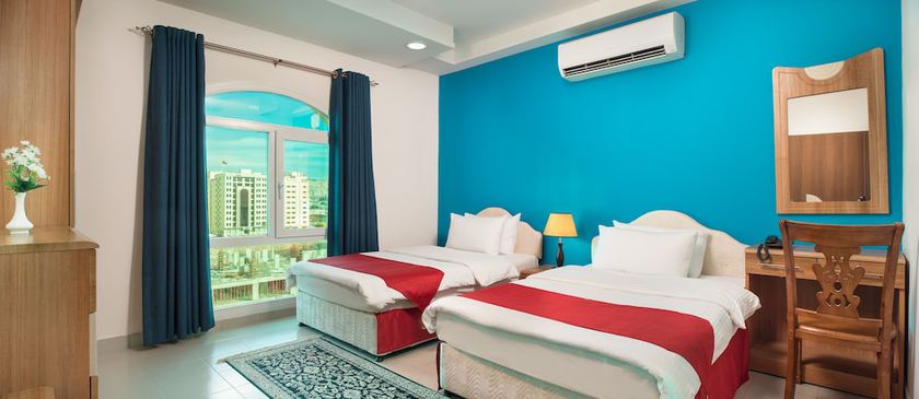 Imagen de la habitación del Hotel Al Manaf Suites. Foto 15