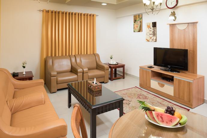 Imagen de la habitación del Hotel Al Manaf Suites. Foto 18