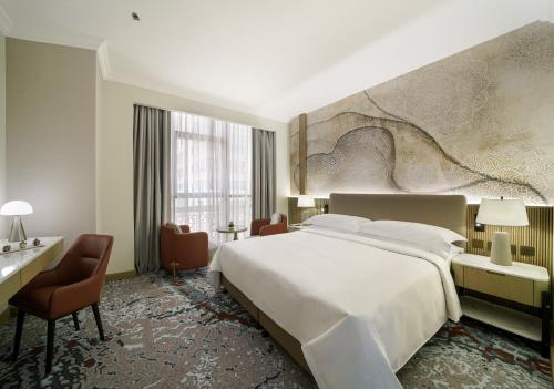 Imagen de la habitación del Hotel Al Manakha Rotana Madinah. Foto 7