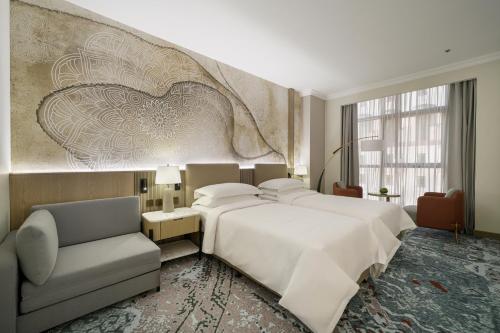 Imagen de la habitación del Hotel Al Manakha Rotana Madinah. Foto 15