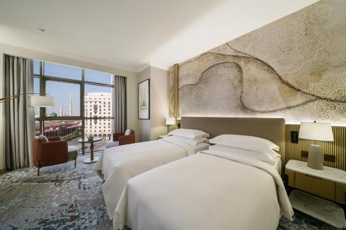 Imagen de la habitación del Hotel Al Manakha Rotana Madinah. Foto 16