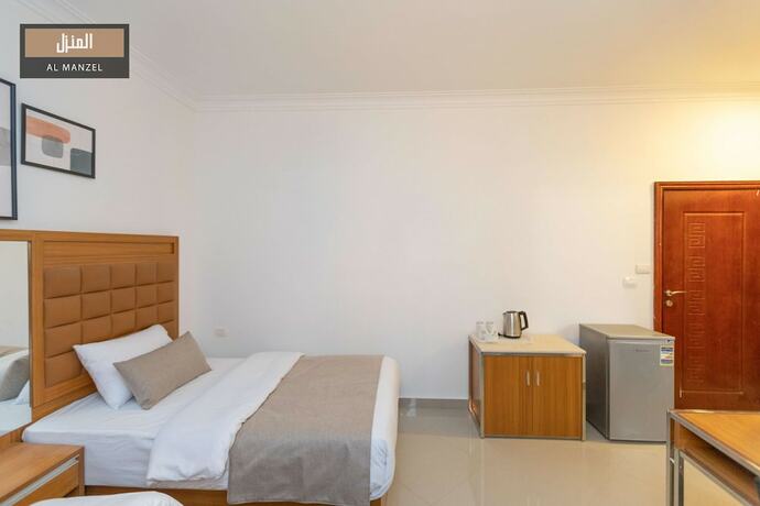 Imagen de la habitación del Hotel Al Manzel Sheikh Zayed. Foto 15