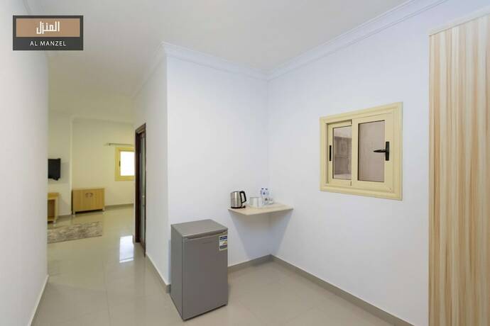 Imagen de la habitación del Hotel Al Manzel Sheikh Zayed. Foto 16
